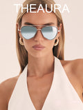 The Aura очки солнцезащитные N6556TD11