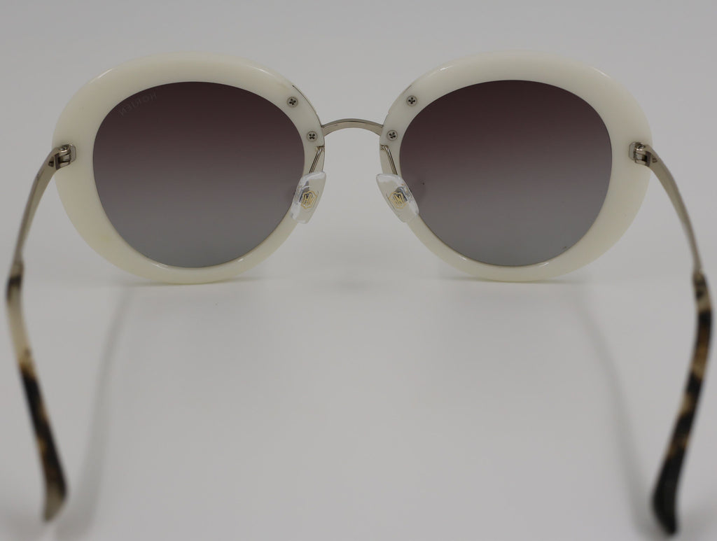 The Aura очки солнцезащитные N6209P16