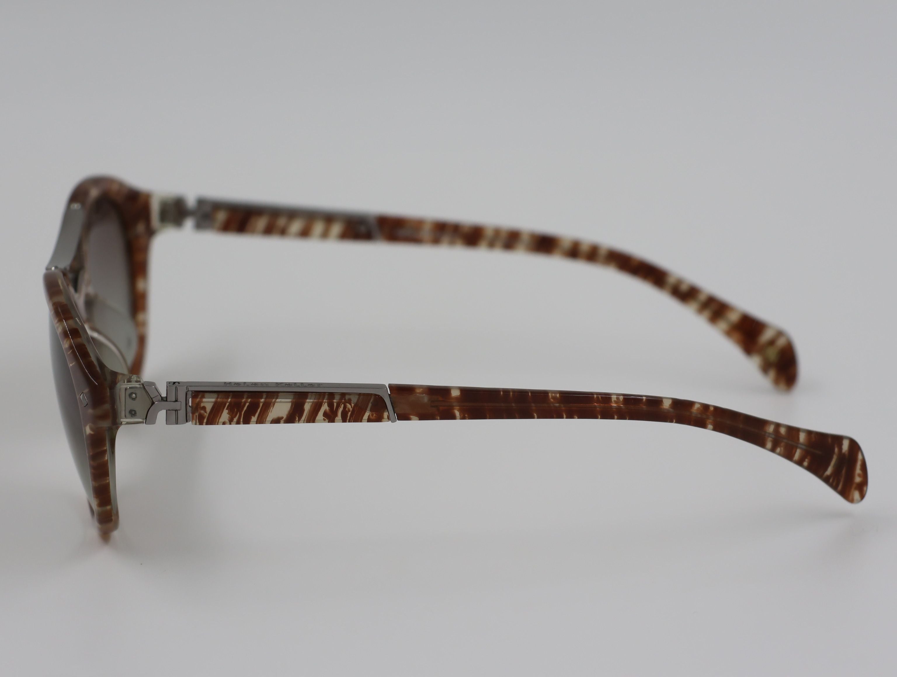 The Aura очки солнцезащитные H8380P99