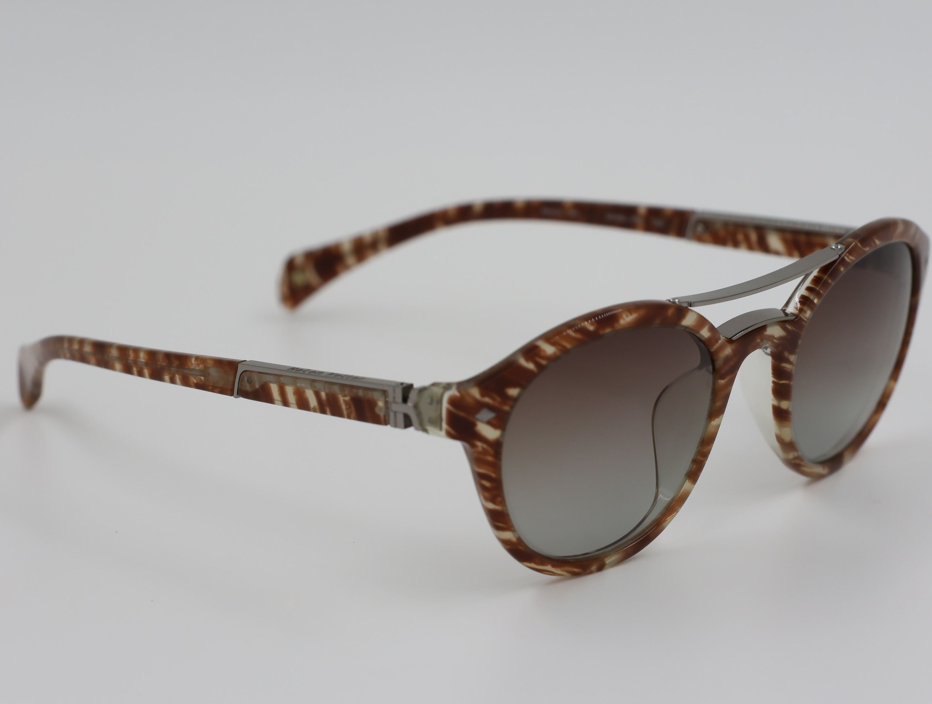 The Aura очки солнцезащитные H8380P99